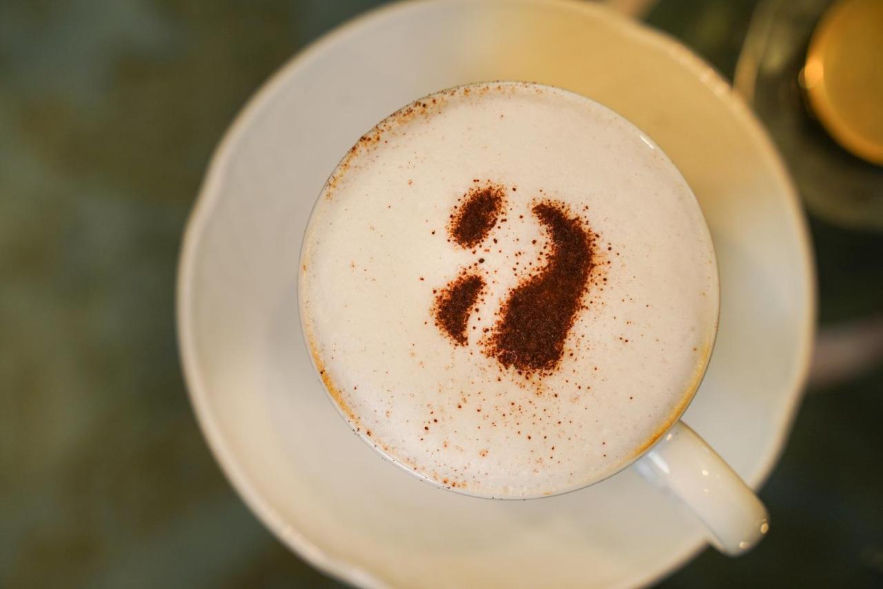 Ambiance Boutique Art Hotel 라호르 외부 사진 A cappuccino with a number 2